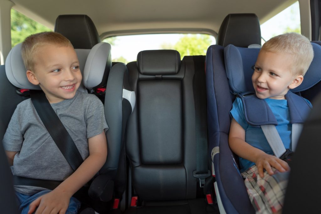 boys in a car excited for a family day out in Cheshire